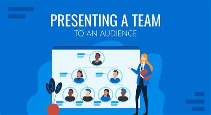 A colleague presenting to a room of colleagues.