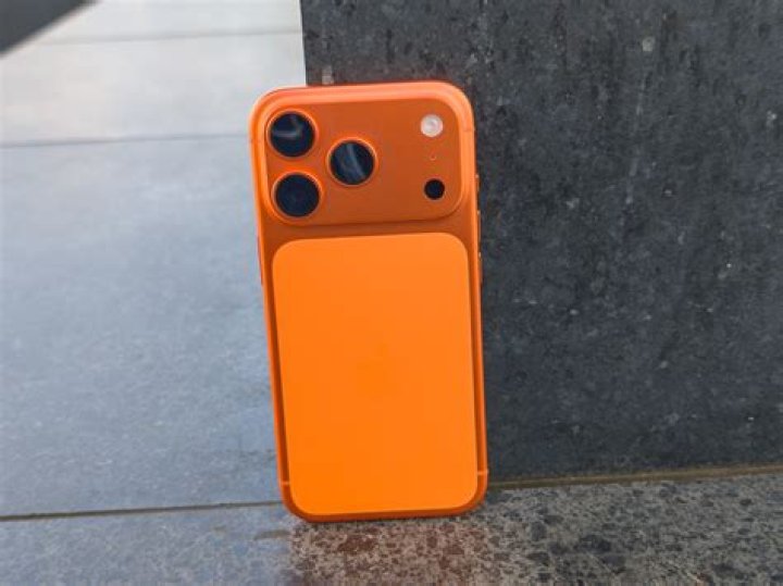An iPhone with the Orange SUccess app on the screen