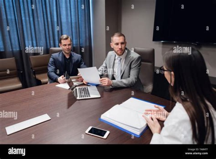 Businessman with coworkers in conference room