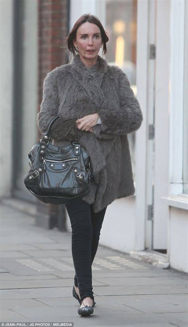 Former Page 3 girl Kathy Lloyd, 54, steps out for a stroll with husband
