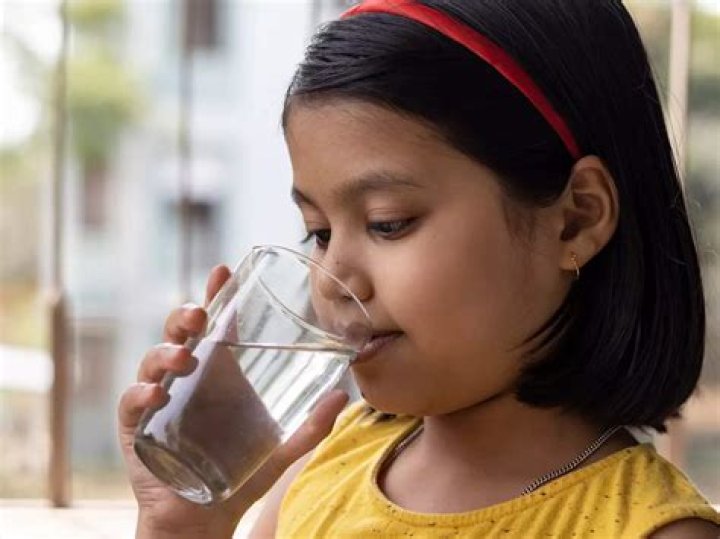 Girls drinking water at the clinic