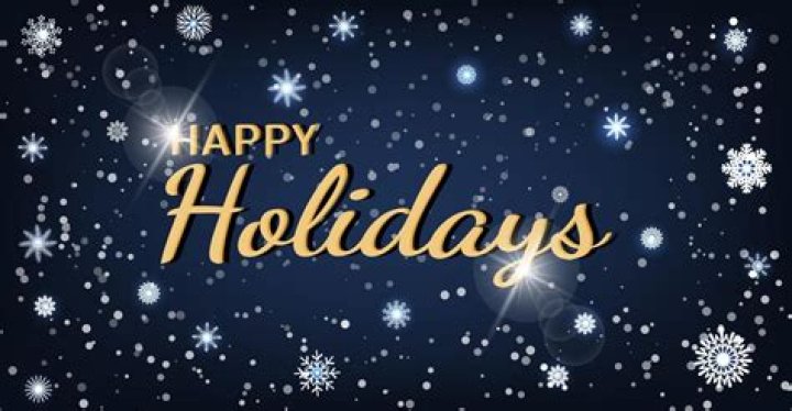 Happy Holidays text on snowy evening Hall of Languages scene