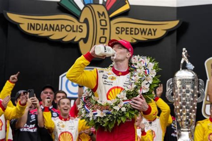 Josef Newgarden drinks milk, relief with Indy 500 triumph