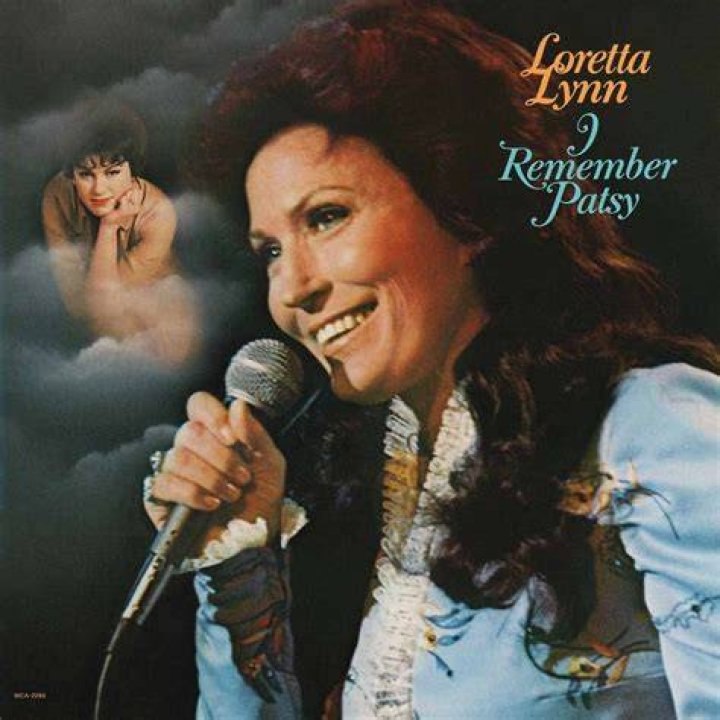 Loretta Lynn and one of her twin daughters with Alison Krause Loretta