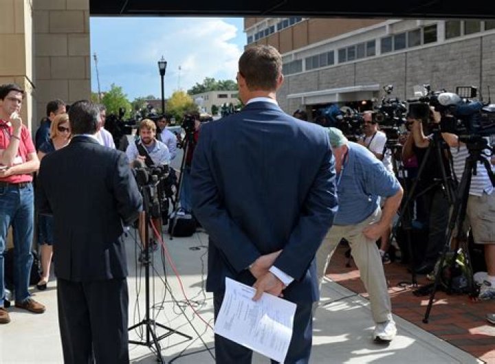 Maddox Kilgore (left), defense attorney for Justin Ross Harris, gives a statement on the indictment against Harris during a press conference at the Cobb County Courthouse September 4, 2014. PHOTO: Kent D. Johnson / AJC