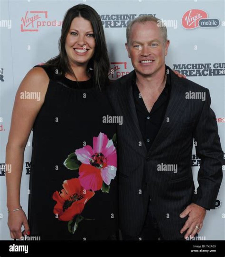 Neal McDonough and his wife Ruve Robertson taking a stroll at The Stock