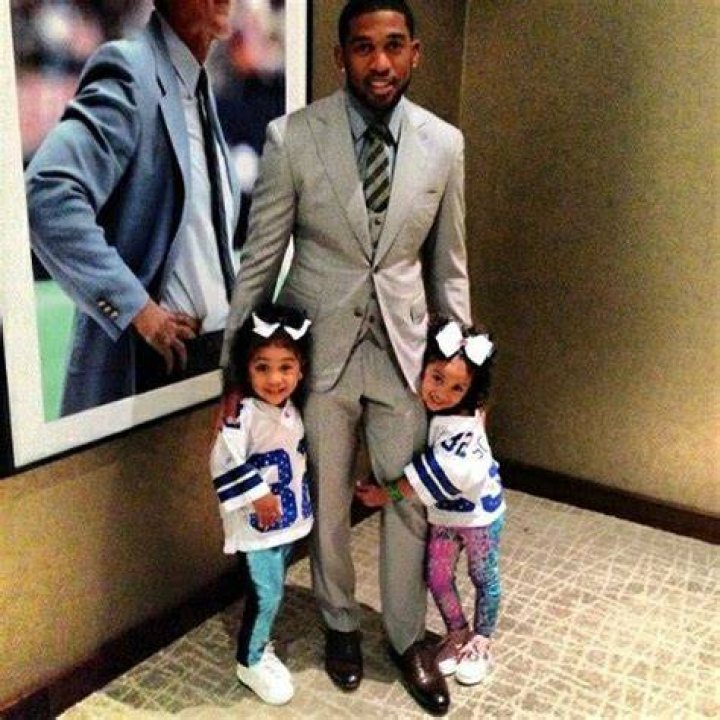 Orlando Scandrick and his twin daughters..adorable picture