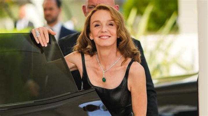Philippine LeroyBeaulieu and her husband attend the 'Aide a L'Enfance