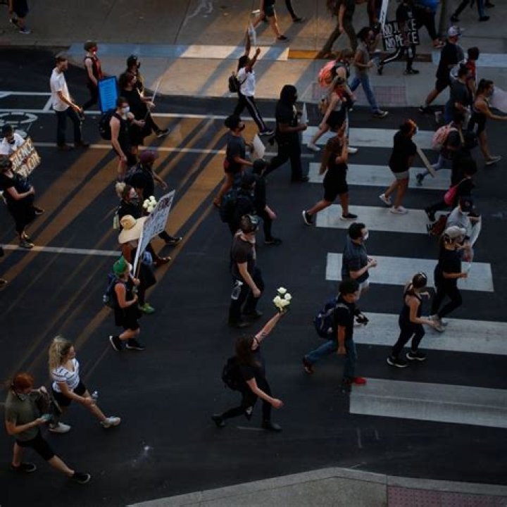 Protesters Hail Charges Against Police but Seek Broader Change The