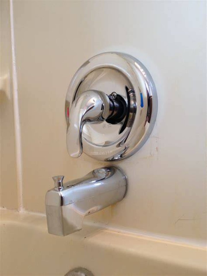Replace bath tub faucet