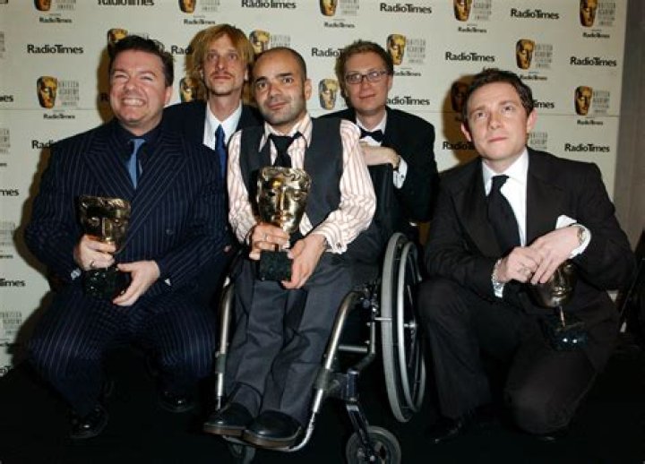 Ricky Gervais cranks his neck as he is dwarfed by tall Stephen Merchant