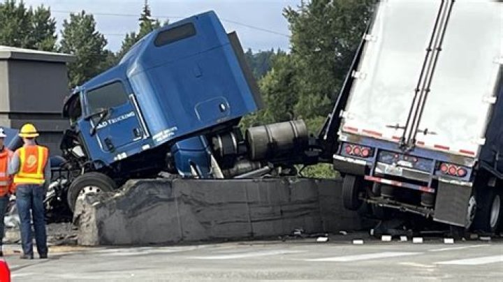 Semi involved in multivehicle crash after running red light in