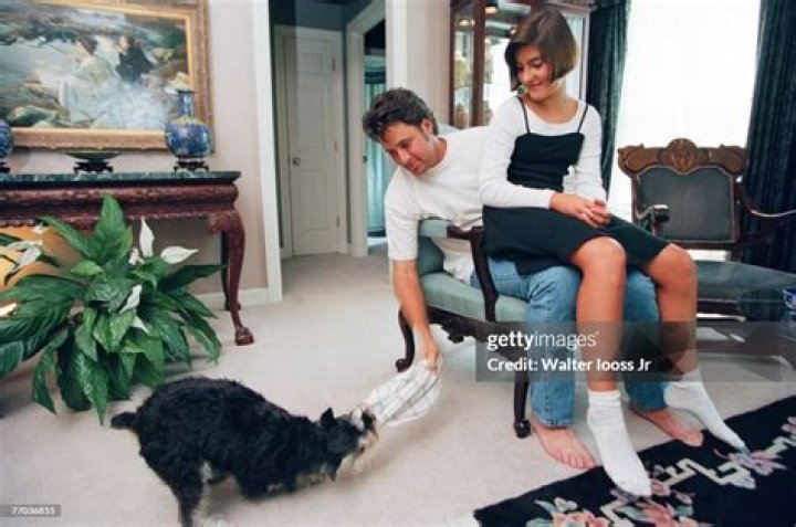Singer Vince Gill poses for a photo with his wife, Janis Gill, and