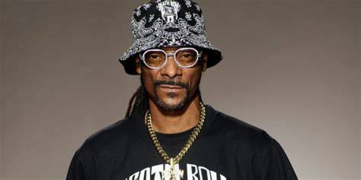 Snoop Dogg's Wife Shante Brodus Stuns in Glittery Jumpsuit and Blue Fur