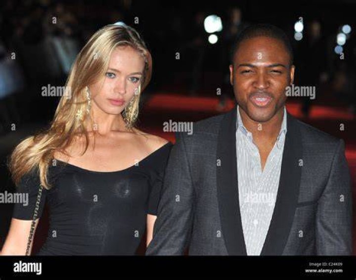 Taio Cruz and Guest UK film premiere of Michael Jackson's 'This Is It' held at the Odeon